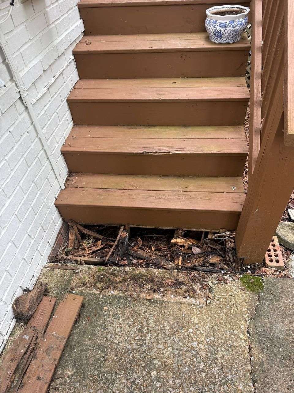 New exterior entry stair treads and risers tied into an existing painted-brick home in Chattanooga, TN