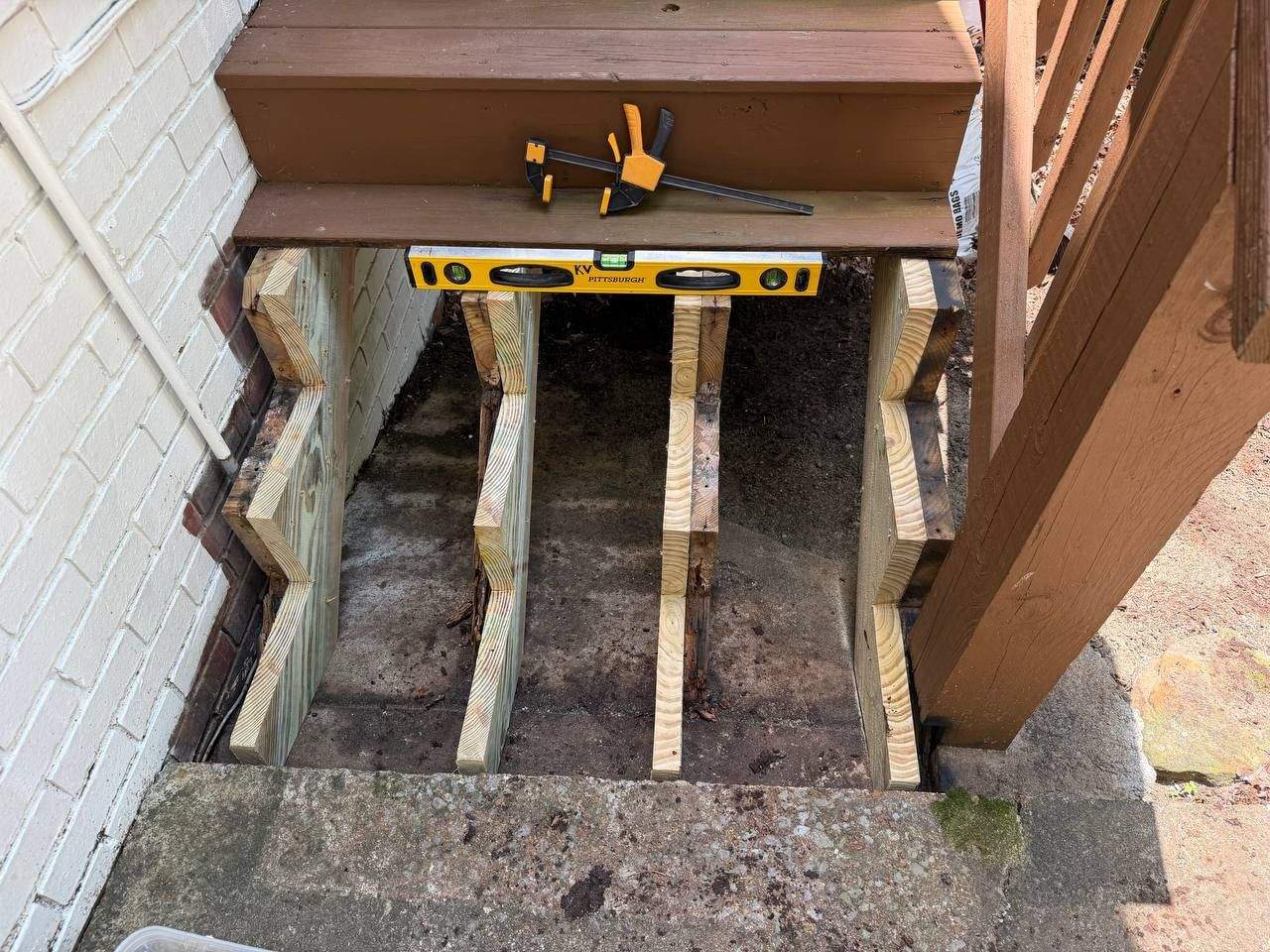 Close-up of new stair treads and risers on a Chattanooga home entry