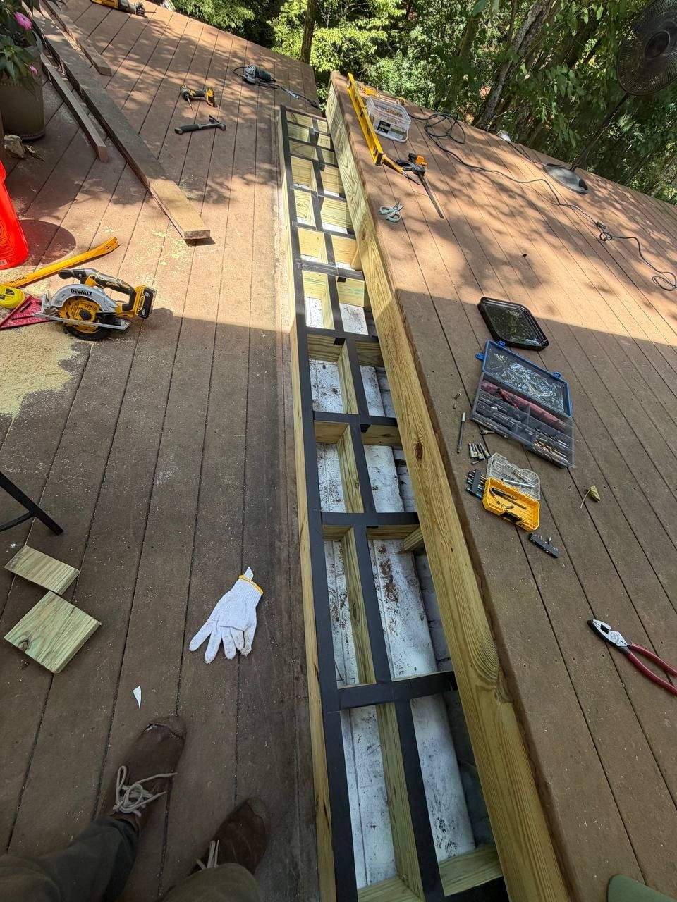 New pressure-treated stair stringers exposed during structural rebuild in Chattanooga, TN